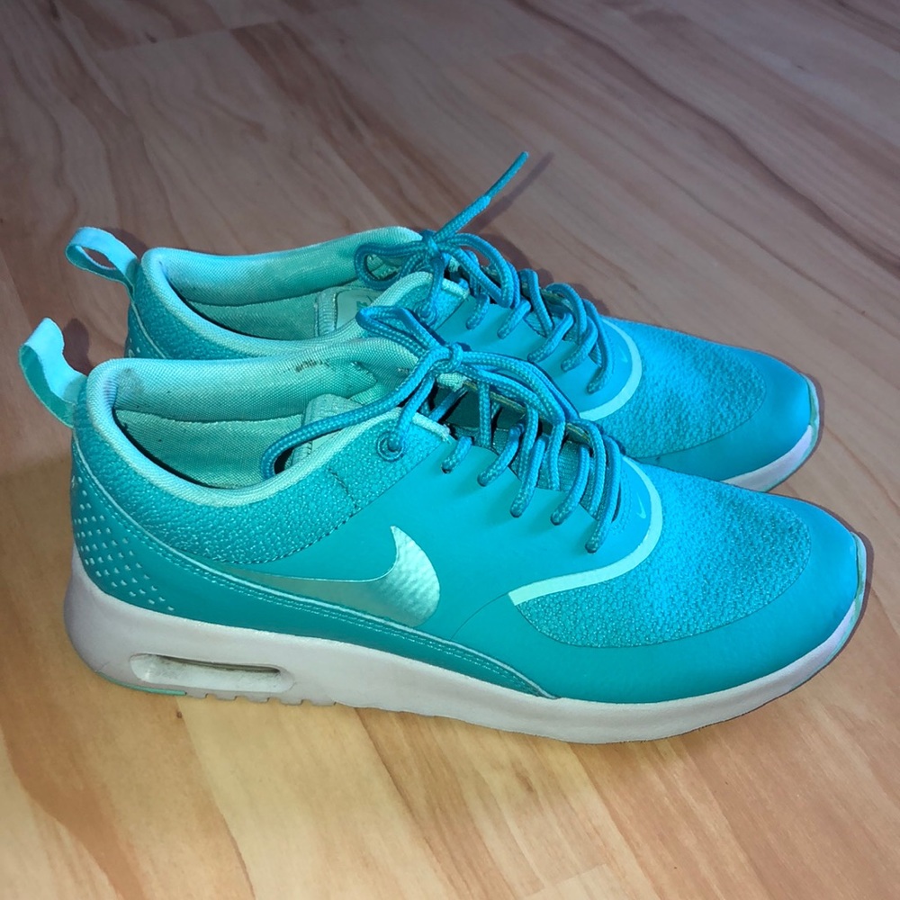 Light blue nike runners